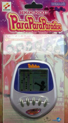 The ParaParaParadise Bemani Pocket in the original packaging. It has five face buttons to correspond to the real game's sensors, and a monochrome LCD screen.